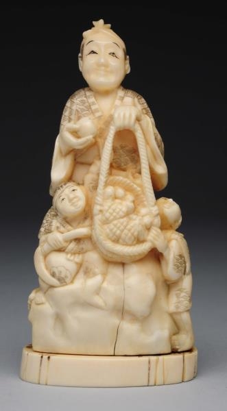 JAPANESE CARVED IVORY WOMAN WITH CHILDREN.        