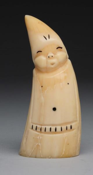 ESKIMO WHALE TOOTH CARVING.                       
