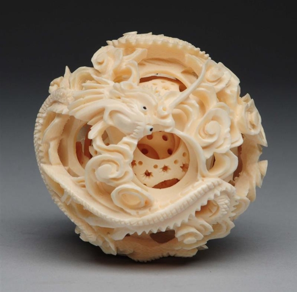 FINELY CARVED CHINESE IVORY BALL.                 