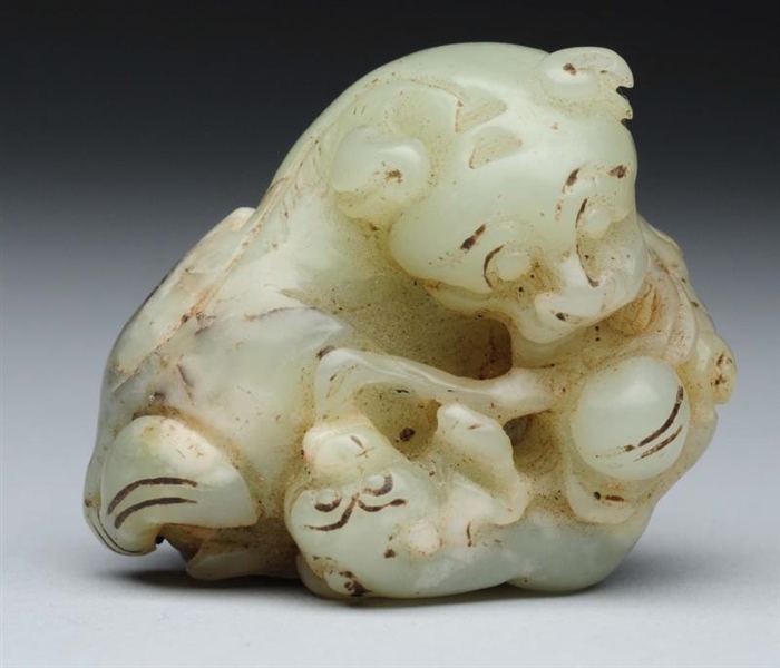 CHINESE CARVED JADE DOGS FIGURE.                  