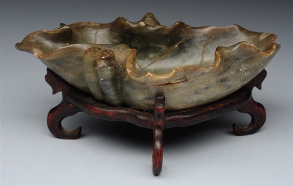 CHINESE CARVED HARD STONE DISH ON STAND.          