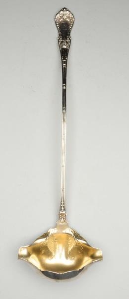 A WHITING STERLING PUNCH LADLE.                   