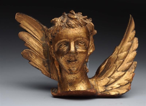18TH CENTURY CARVED WOODEN HEAD WITH WINGS.       