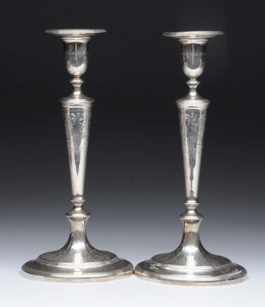PAIR OF TIFFANY STERLING CANDLESTICKS.            