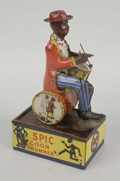 MARX SPIC COON DRUMMER TOY.                       