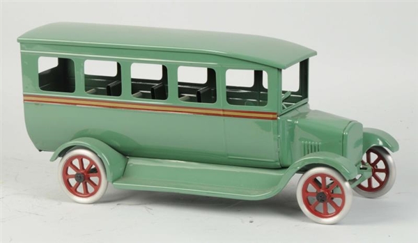 PRESSED STEEL CONTEMPORARY COWDERY PASSENGER BUS. 