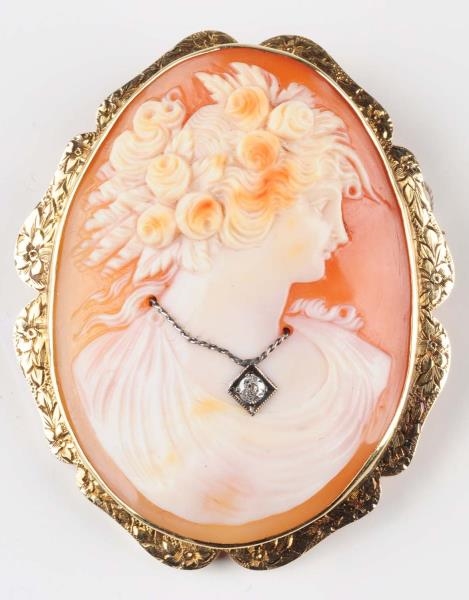 GOLD AND SHELL CAMEO BROOCH.                      