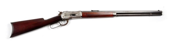 WINCHESTER MODEL 1886 LEVER ACTION RIFLE.         