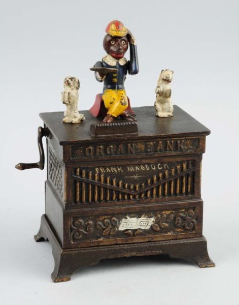 ORGAN WITH DANCING CAT AND DOG MECHANICAL BANK.   