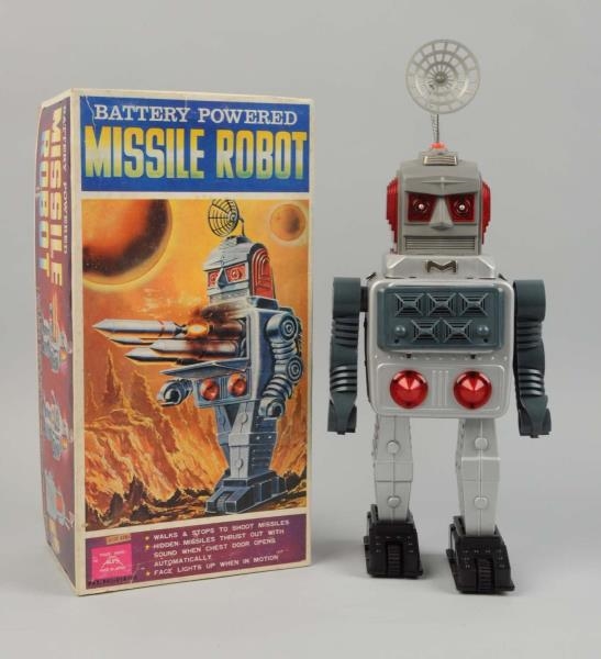 JAPANESE TIN PAINTED BATTERY OP MISSILE ROBOT.    