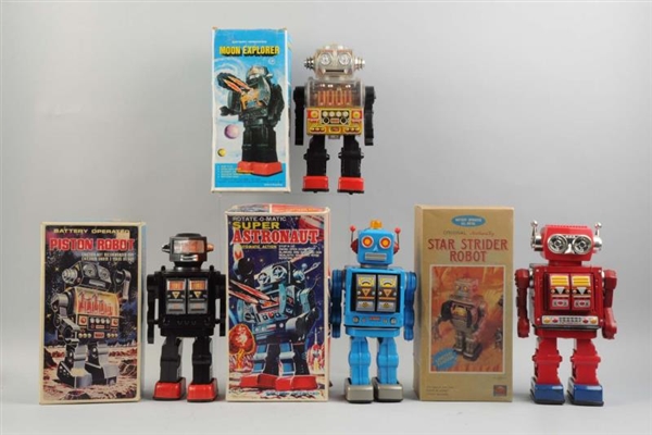 LOT OF 4:  FOREIGN BATTERY OPERATED ROBOTS.       