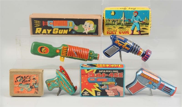 LOT OF 4: JAPANESE SPACE GUNS IN BOXES.           