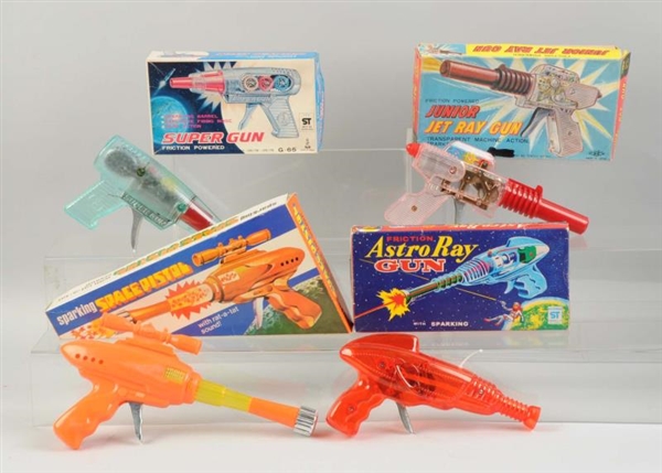 LOT OF 4: FOREIGN MADE SPACE GUNS IN BOXES.       