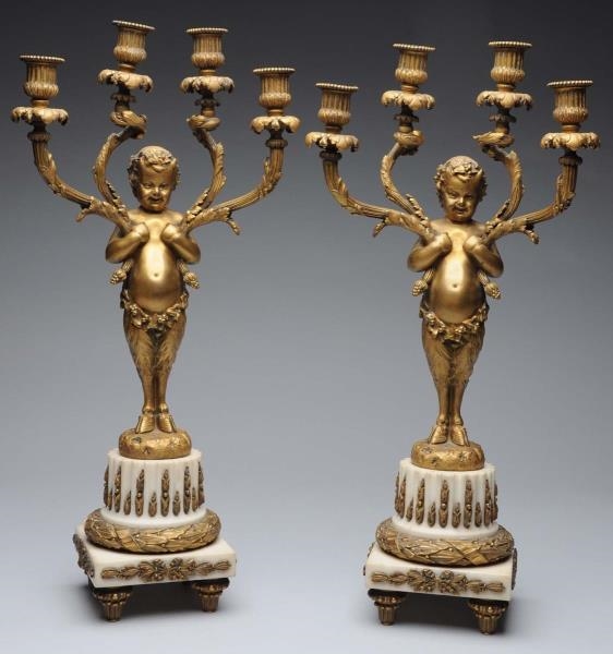 PAIR OF FRENCH GILT BRONZE CANDELABRAS.           