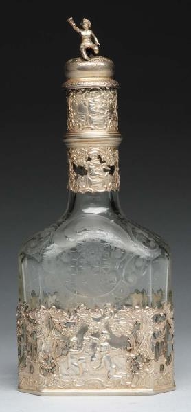 SILVER MOUNTED GLASS DECANTER.                    