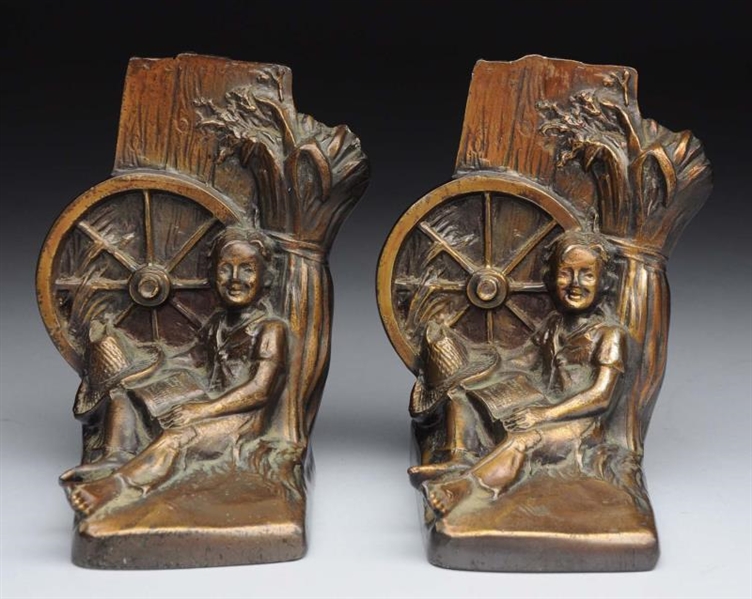 PAIR OF BRONZE BOOKENDS.                          