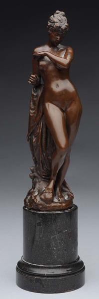 ANTIQUE BRONZE FIGURE OF A WOMAN ON BASE.         
