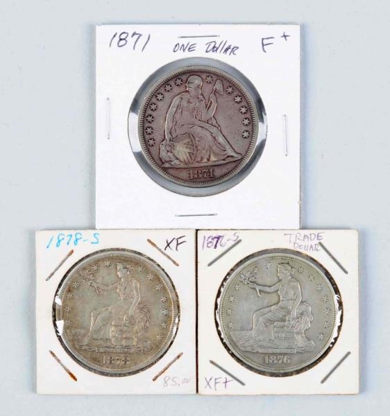 LOT OF 3: TWO TRADE DOLLARS AND A SEATED LIBERTY. 