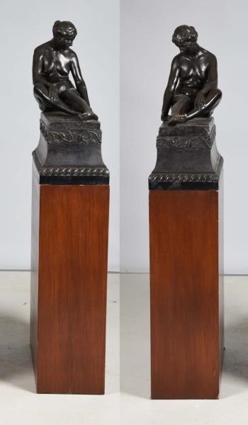PAIR OF AMERICAN BRONZE RECLINING NUDES.          