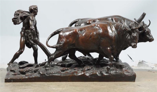 BRONZE OF A FARMER AND AN OXEN.                   