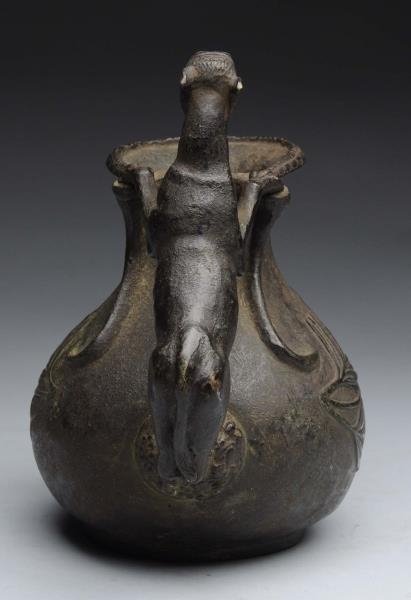 EARLY BRONZE VESSEL WITH LARGE CAT.               