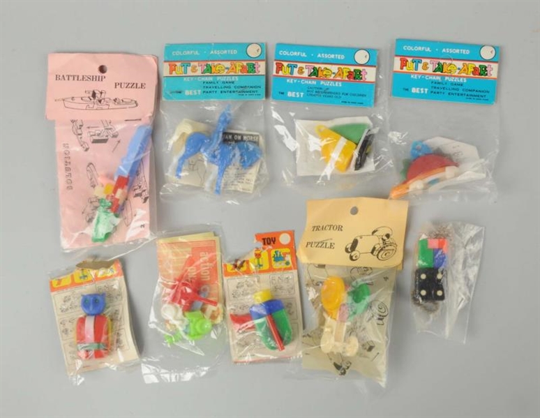 LOT OF 9: KEYCHAIN PUZZLES.                       