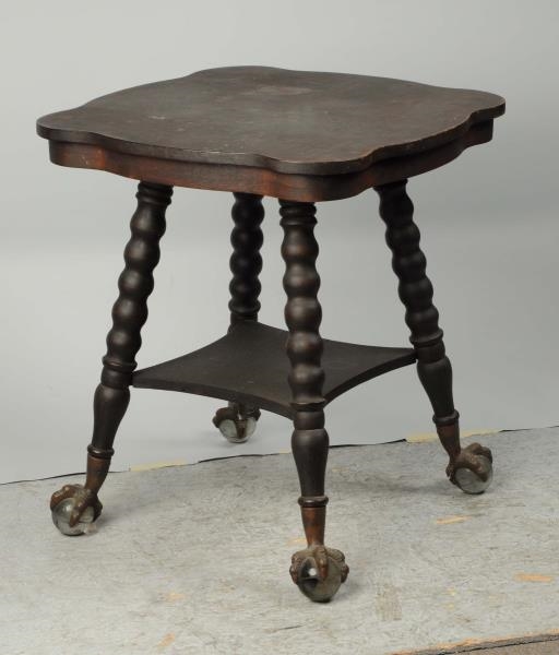 GLASS BALL CLAW FOOT OAK OCCASIONAL TABLE.        