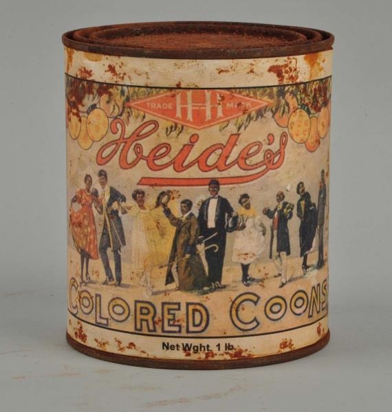 HEIDES COLORED COONS TIN WITH PAPER LABEL.       