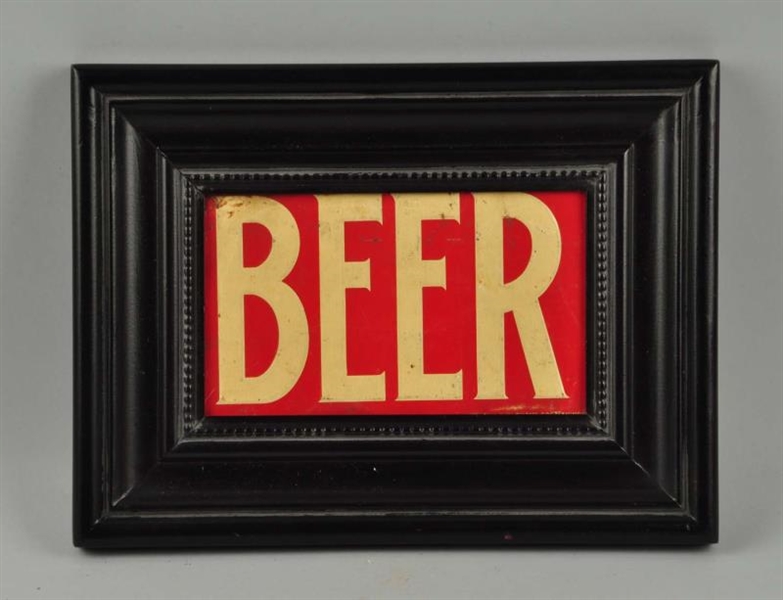 EMBOSSED TIN BEER SIGN.                           