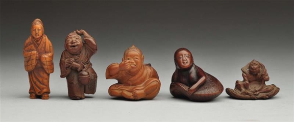 LOT OF 5: CARVED WOODEN FIGURES.                  