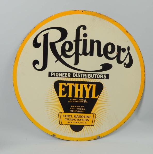 REFINERS WITH ETHYL LOGO SIGN.                    
