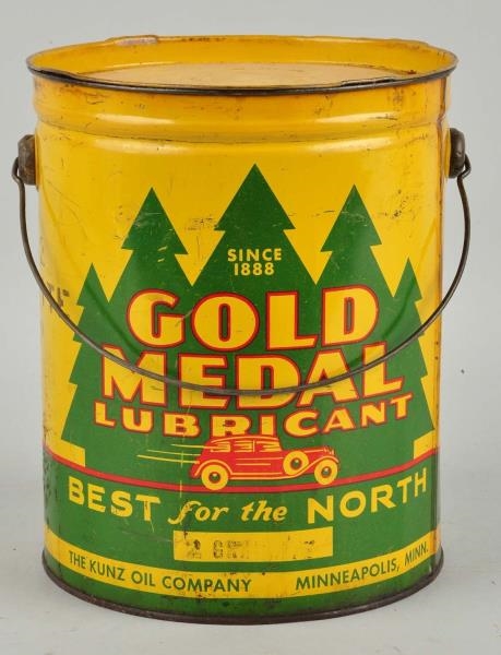 GOLD MEDAL LUBRICANT, KUNZ OIL CO. WITH CAR LOGO. 