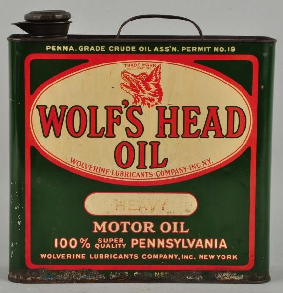WOLFS HEAD MOTOR OIL WITH LOGO CAN.              