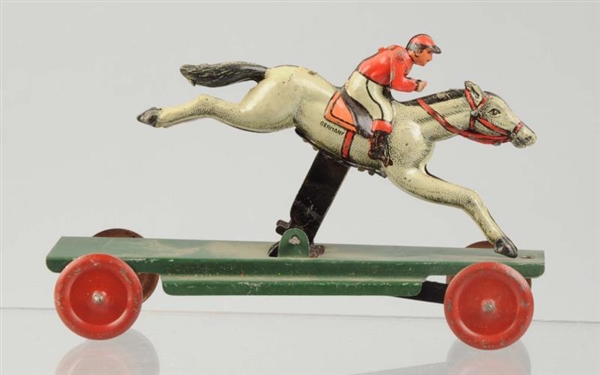 GERMAN TIN LITHO ARTICULATED HORSE PENNY TOY.     