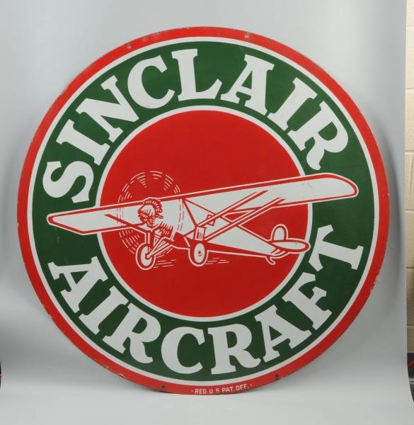 SINCLAIR AIRCRAFT WITH MONOCOUPE GRAPHICS SIGN.   