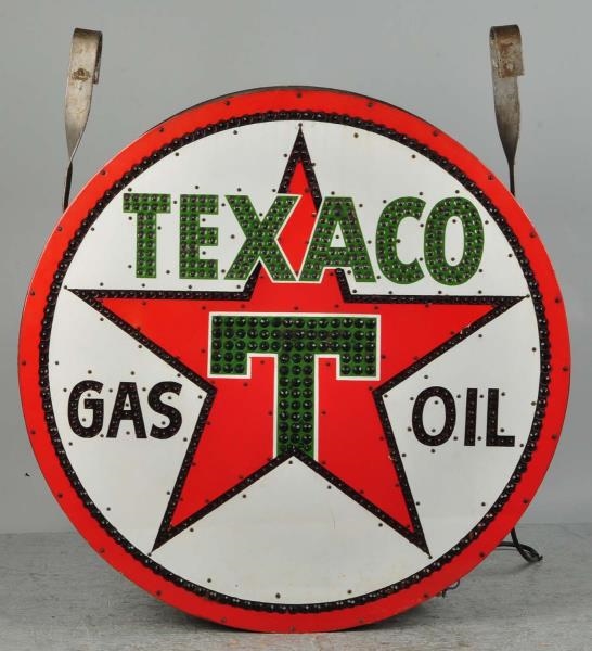 TEXACO GAS OIL INTERNALLY LIGHTED CAN SIGN.       