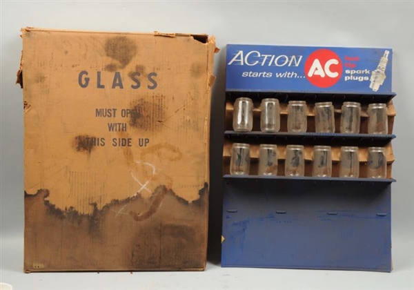 NIB ACTION STARTS WITH AC SPARK PLUGS DISPLAY.    