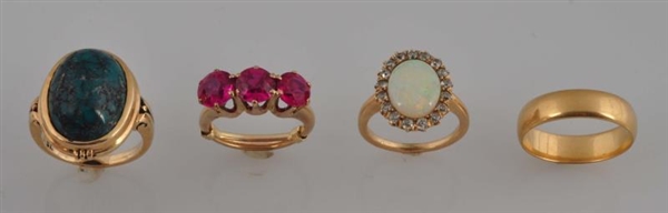 LOT OF 4: YELLOW GOLD RINGS.                      