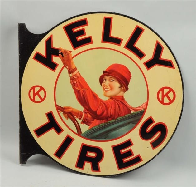 KELLY TIRES WITH "LOTTA MILES" WAVING SIGN.       