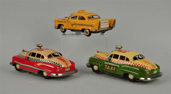 LOT OF 3: JAPANESE TIN LITHO TAXIS.               