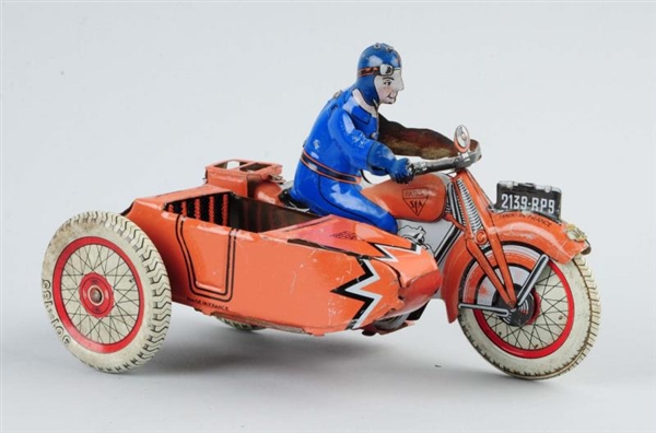 FRENCH TIN LITHO WIND UP MOTORCYCLIST TOY.        