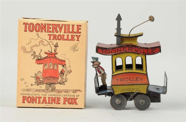 GERMAN TIN LITHO WIND UP TOONERVILLE TROLLEY TOY. 
