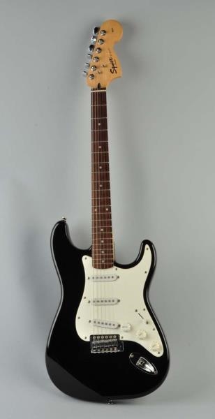 FENDER SQUIRE ELECTRIC GUITAR WITH CASE.          