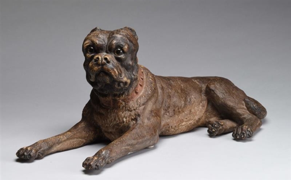 ANTIQUE DOG FIGURE WITH GLASS EYES.               