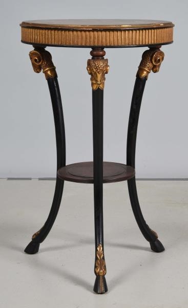 VERY ORNATE SMALL TABLE WITH RAM HEAD MOTIF.      