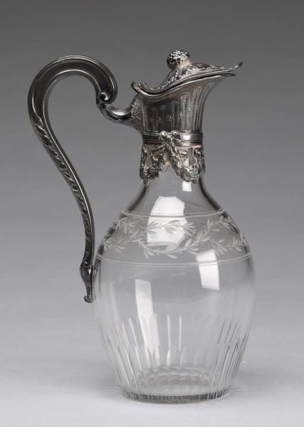 CUT GLASS JUG WITH SILVER PLATED HANDLE AND LID.  