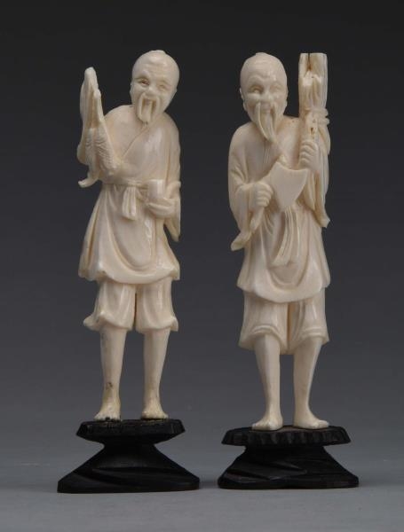PAIR OF JAPANESE IVORY FIGURES.                   