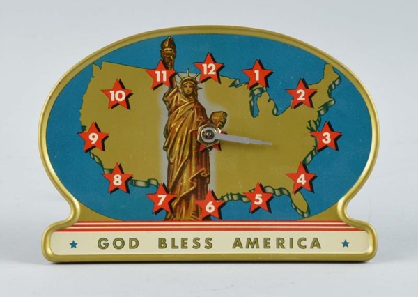 1940 GOD BLESS AMERICA TIN CLOCK.                 