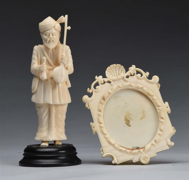 EARLY MINIATURE CARVED IVORY PICTURE FRAME.       