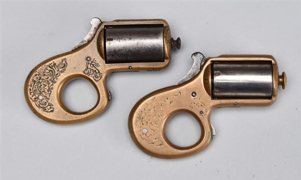 PAIR OF ANTIQUE MY FRIEND KNUCKLE DUSTER PISTOLS. 